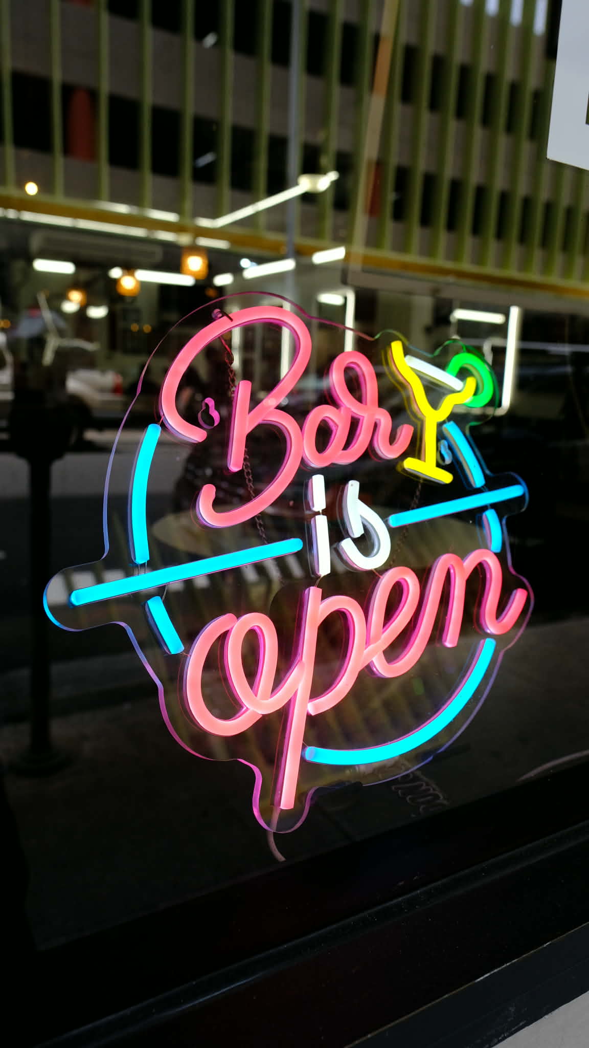 Bar is Open neon sign at Vintage Barbershop Bar Honolulu
