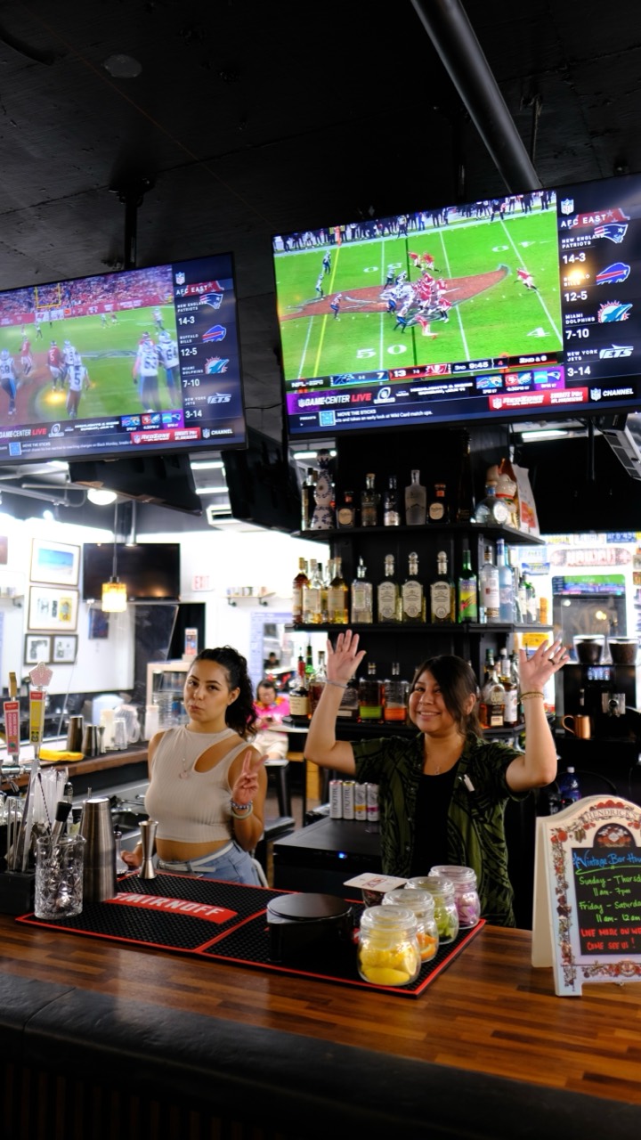 Vintage Bar and Coffee Honolulu with bartenders and sports on TV