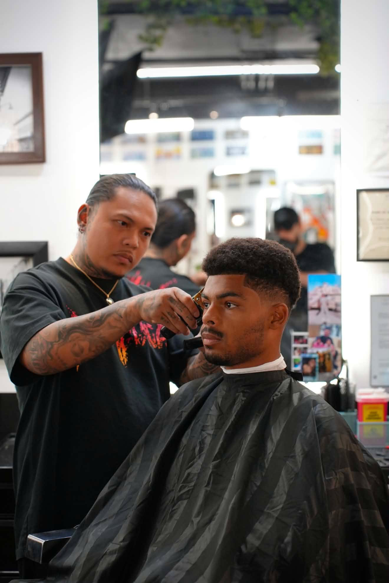 Clean taper fade haircut with lineup at Vintage Barbershop Honolulu
